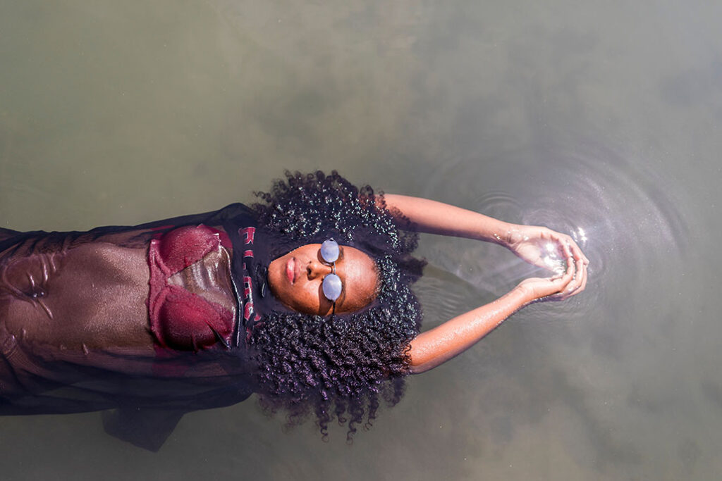 woman floating in a pool